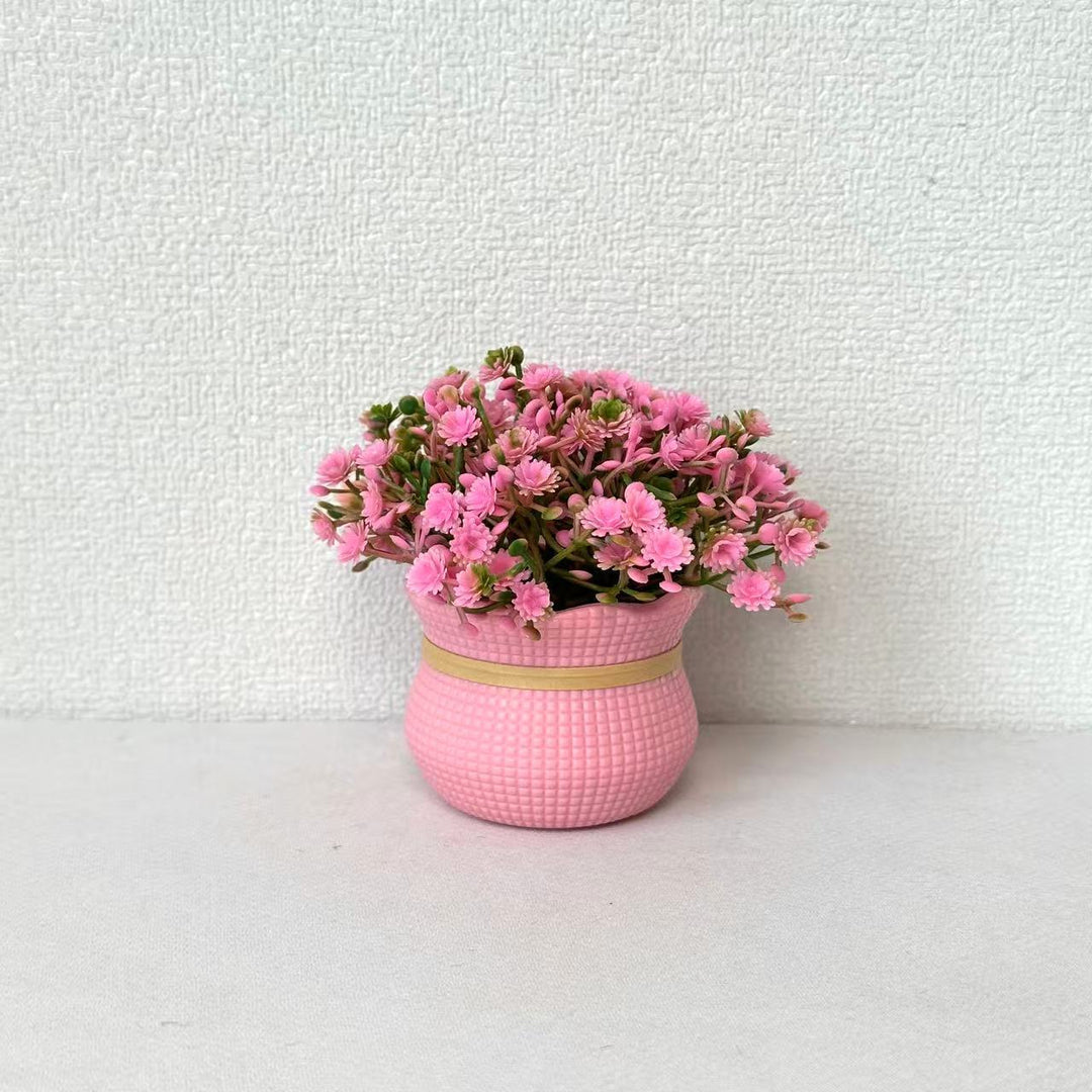 Dekorative Miniatur Kunstblumen Arrangement