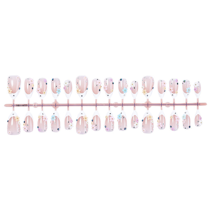 Dekorativer Press-On Nagelset mit floralen Verzierungen Karnz