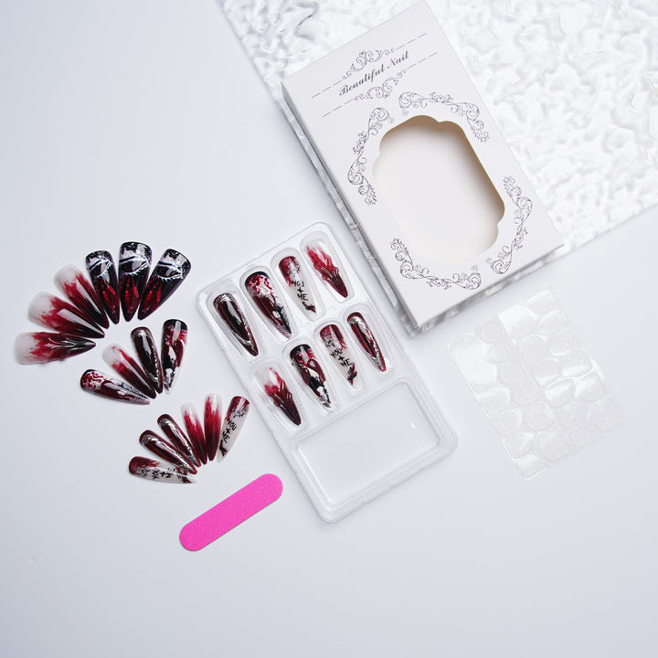 Exklusive Kunstnägel mit floralem Design Karnz