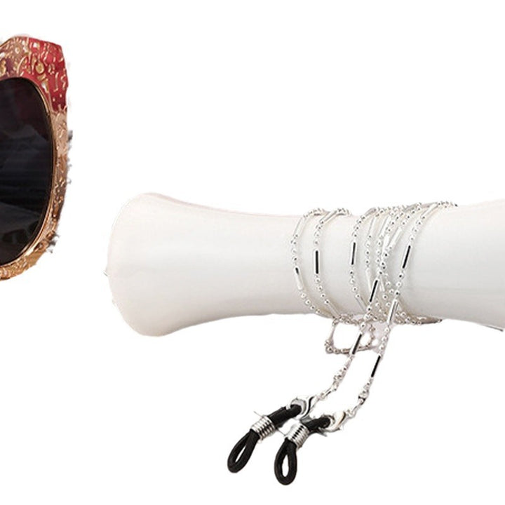Kette mit Anpassungselementen Karnz