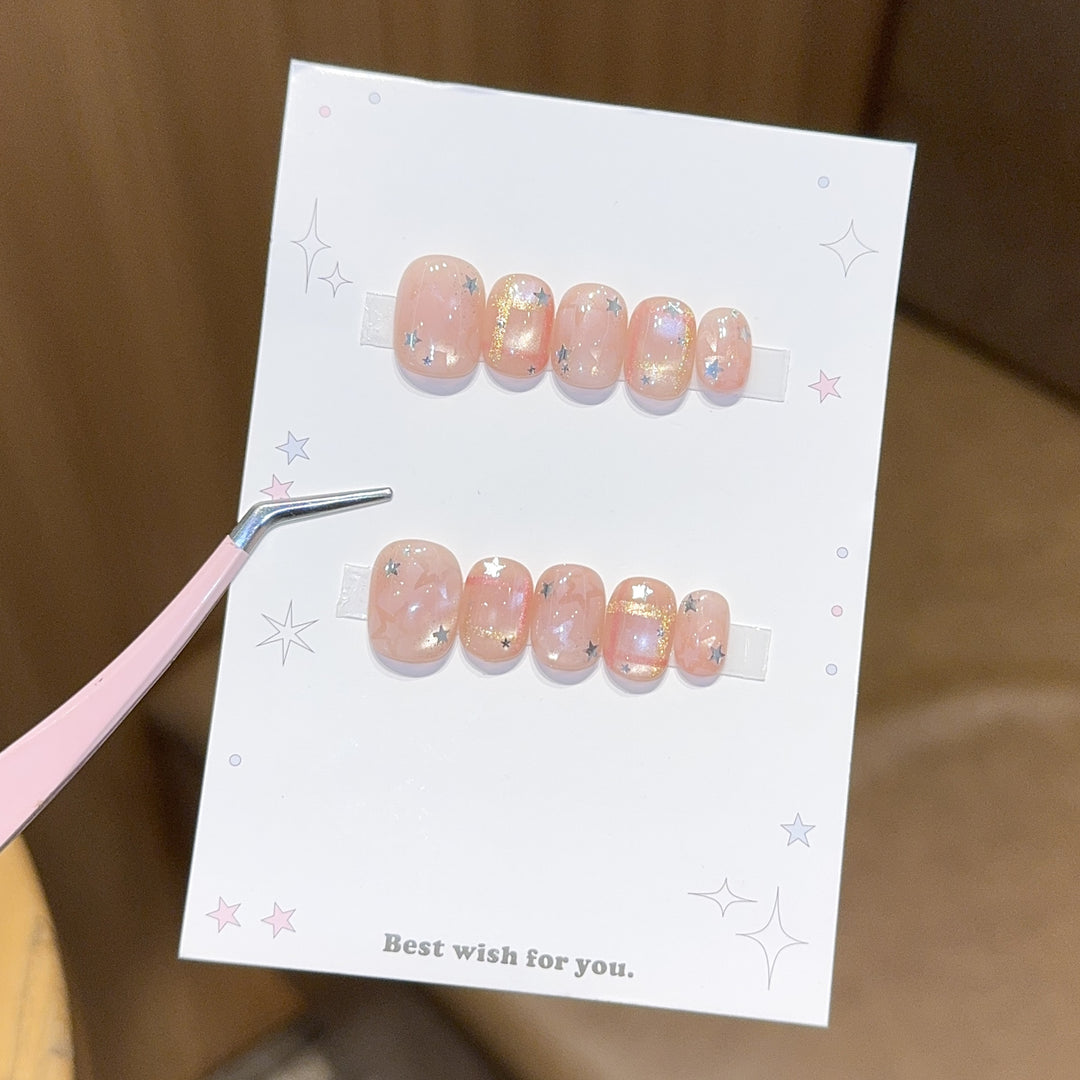 Glamouröse Kunstnagelspitzen mit Sternen Design Karnz