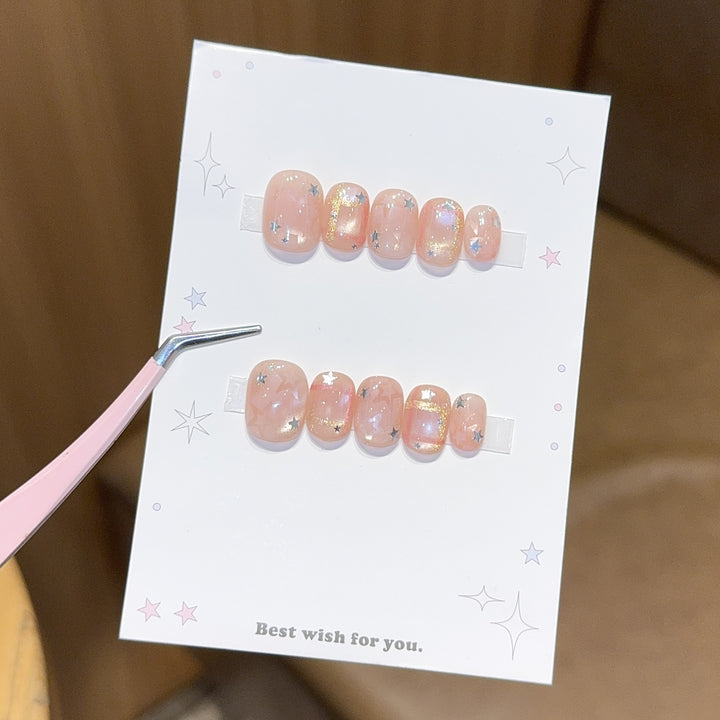 Glamouröse Kunstnagelspitzen mit Sternen Design Karnz
