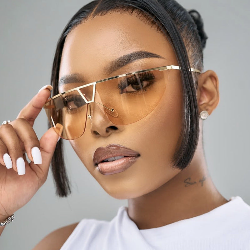 Damen futuristische Sonnenbrille mit schützendem Metallrahmen Karnz