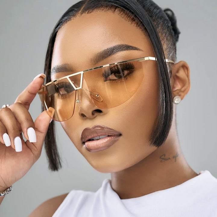 Damen futuristische Sonnenbrille mit schützendem Metallrahmen Karnz