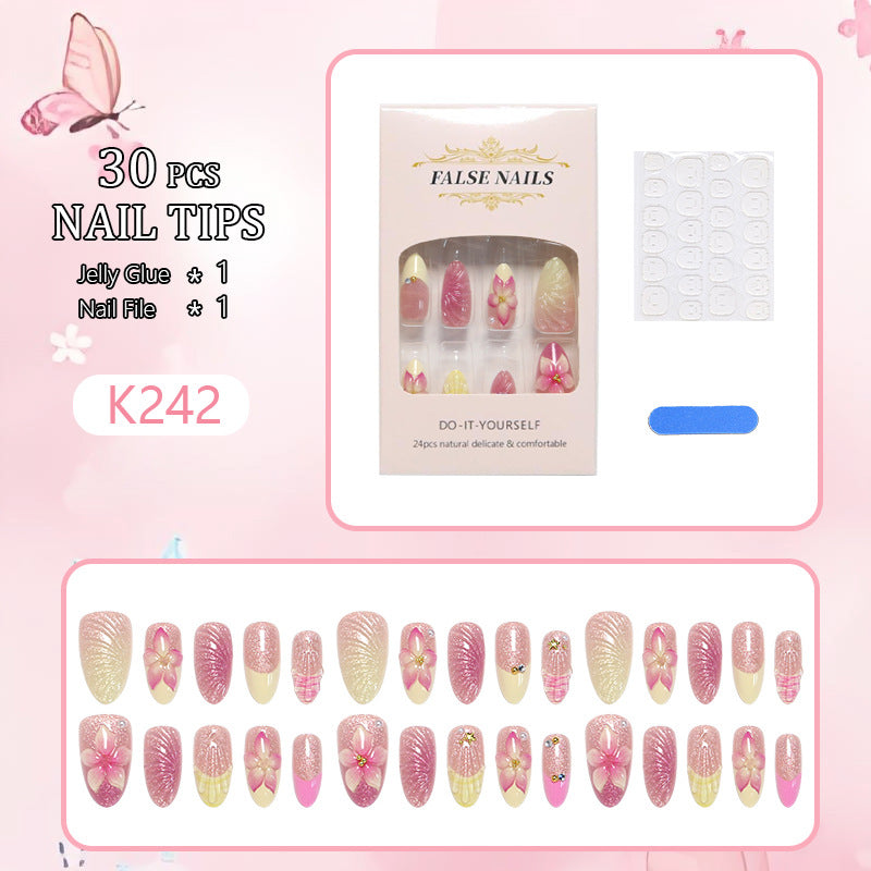 Kunstnagelset mit floralen 3D-Verzierungen Karnz