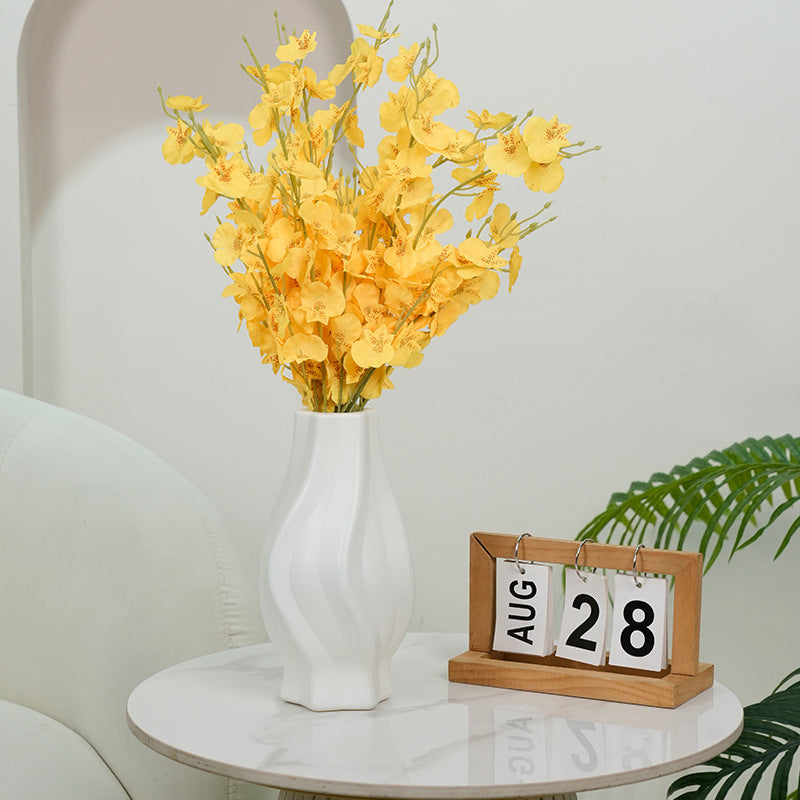 Elegante geschwungene dekorative Blumenvasen Karnz