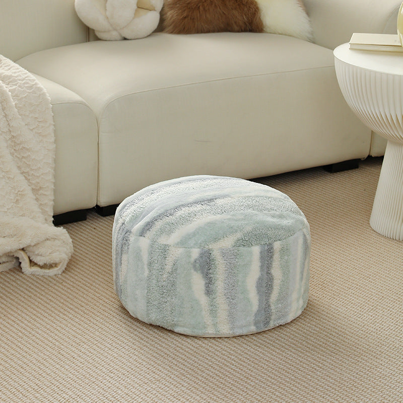 Rundes Sitzpouf aus Teddy‑Fleece mit weichem Strukturbezug