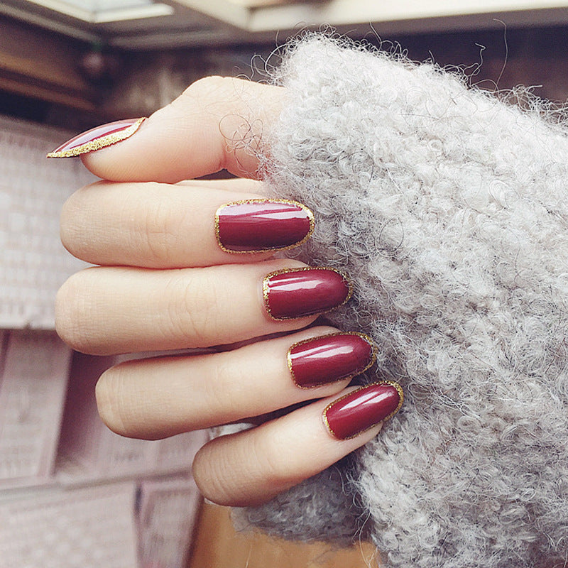 Elegante Glänzende Press-On Nägel mit Goldrand