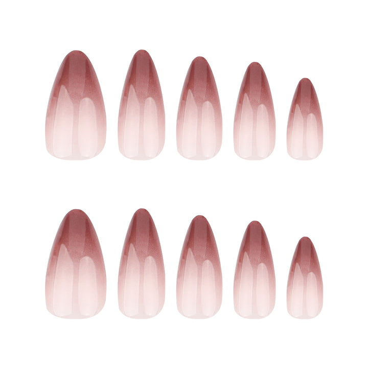 Kunstvolle Stiletto-Nägel mit elegantem Ombre-Design Karnz