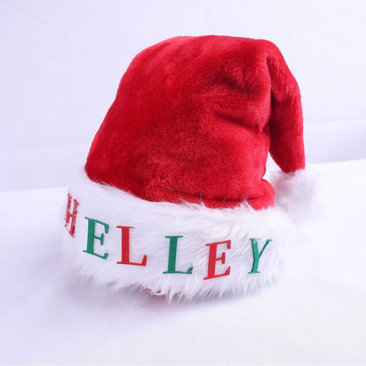 Weihnachtsmütze mit Lichtern und Applikationen