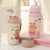 Damen Isolierflasche mit Tiermotiv und Trageschlaufe Karnz