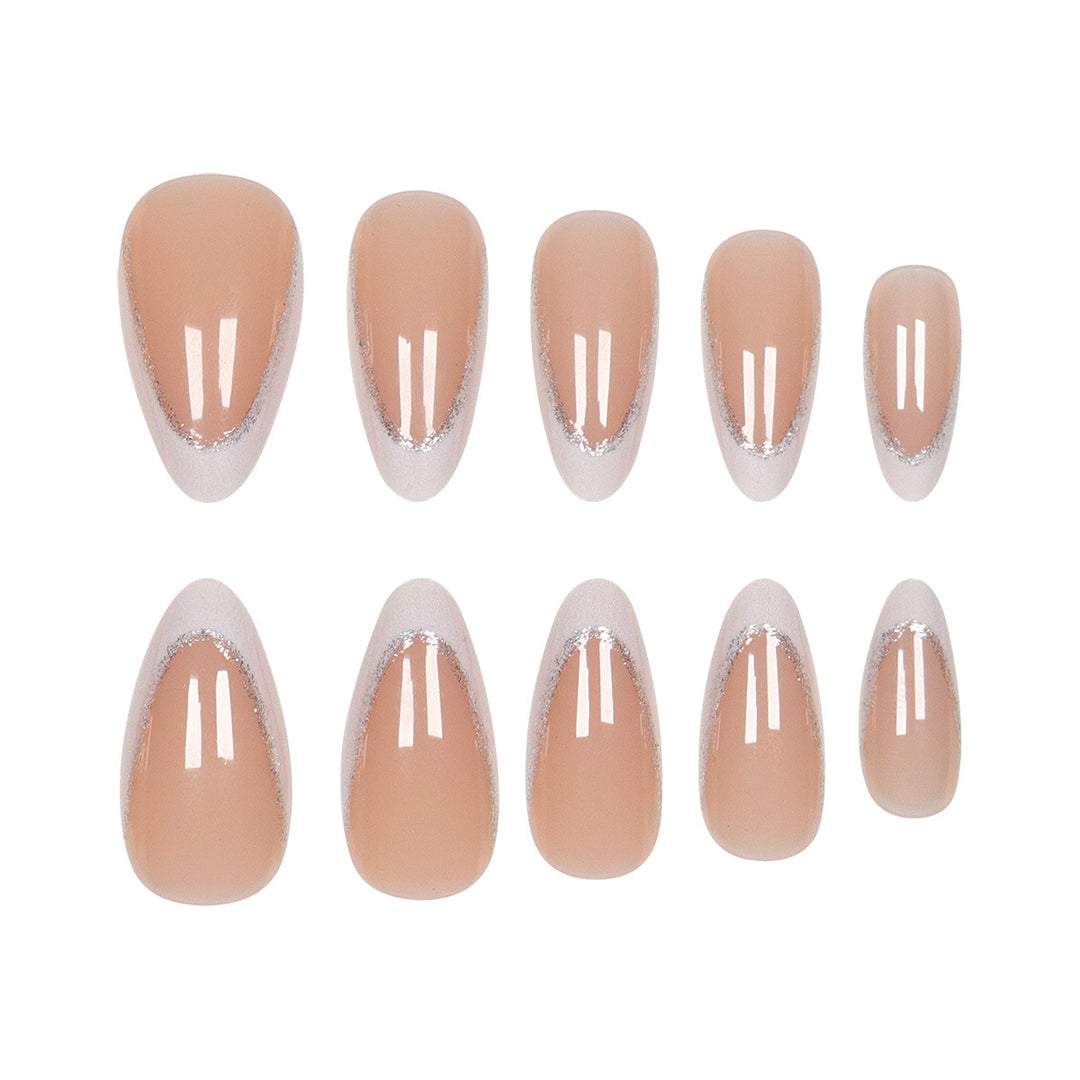 Elegante Stiletto-Klebe-Nägel mit silbernen Glitzerakzenten Karnz