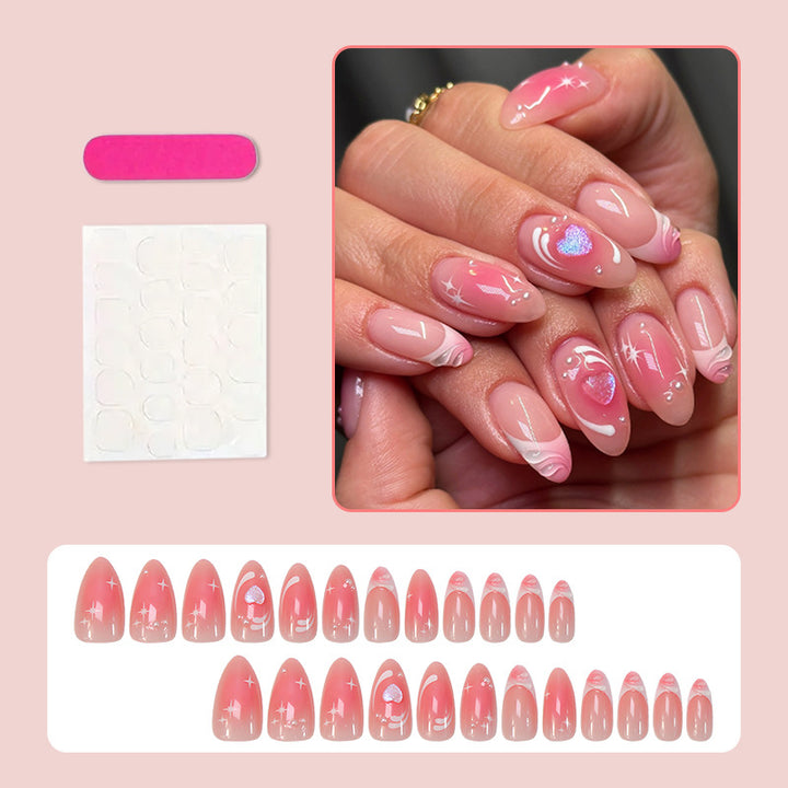 Kunstnagelset mit romantischem Herz-Design und Glitzerakzenten Karnz