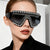 Damen Fashion-Sonnenbrille mit luxuriösem Kettenrahmen und schimmernden Akzenten Karnz