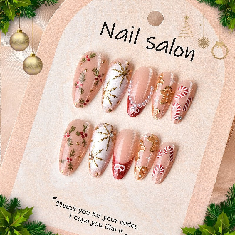 Kunstnagelset mit eleganten Weihnachtsmotiven und Glitzerakzenten Karnz