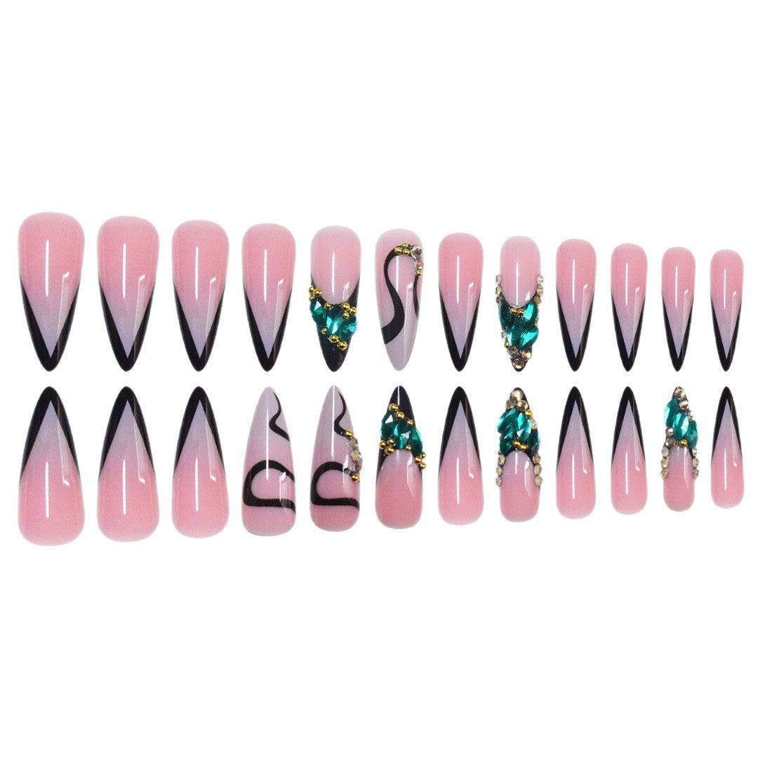 Künstlerische Stiletto Press-On Nagelkunst mit Edelsteinakzenten Karnz
