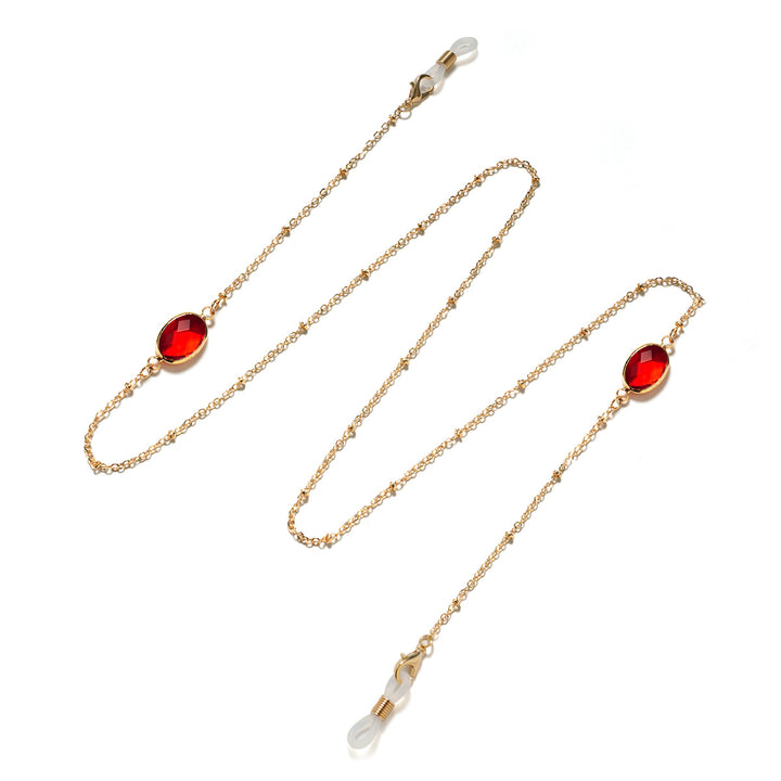 Eleganter mit Edelsteinen verzierter Brillenhalter Karnz