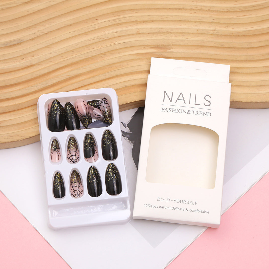 Künstlerisches Press-On Nagelset mit Glitzer und Spinnennetzdesign Karnz