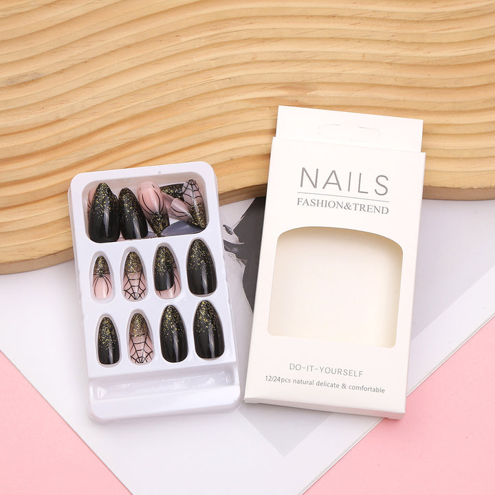 Künstlerisches Press-On Nagelset mit Glitzer und Spinnennetzdesign Karnz
