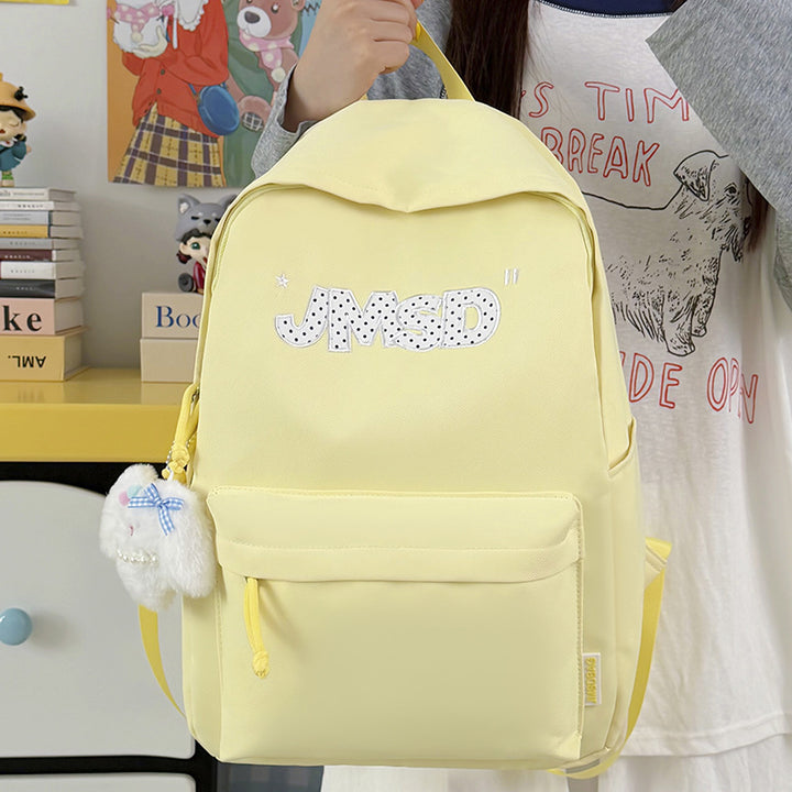 Trendy lässiger Tagesrucksack mit süßem Charakterakzent Karnz