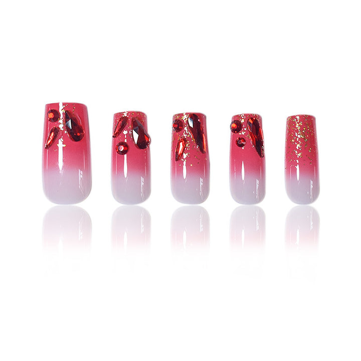 Dekoratives Acryl Press-On Nagelset mit Edelsteinakzenten Karnz