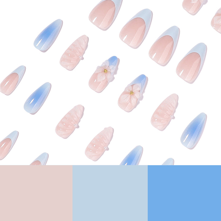 Stiletto-Nägel mit floralem Design und Glitzer Akzenten Karnz