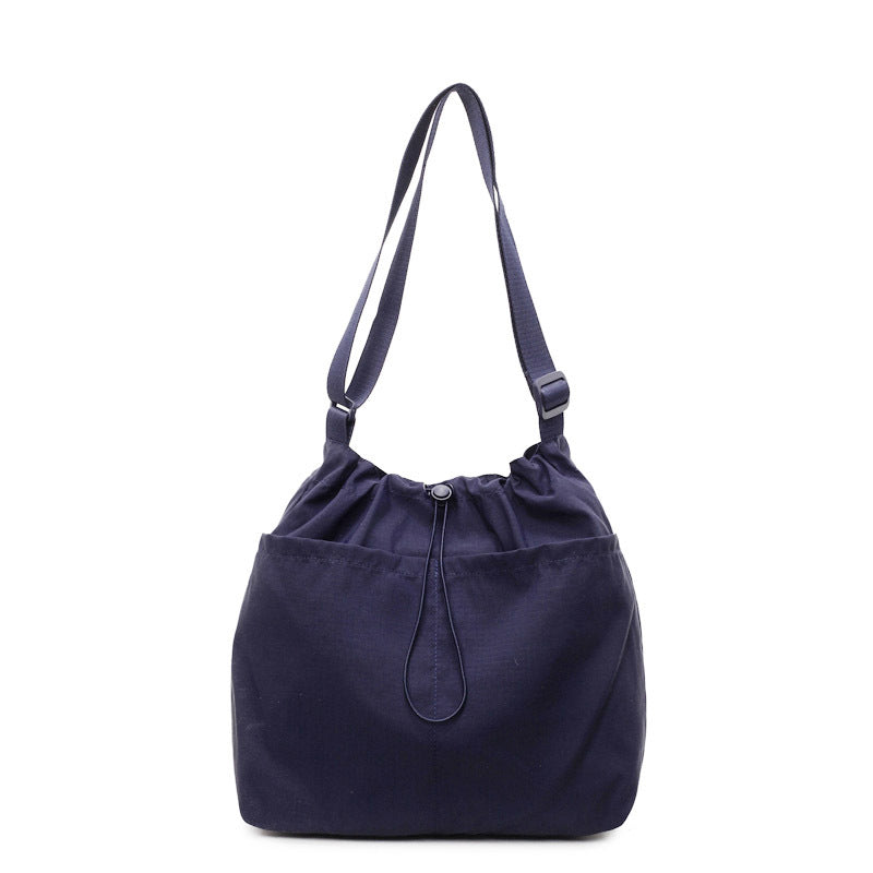 Kordelzugverschluss Utility Schultertasche