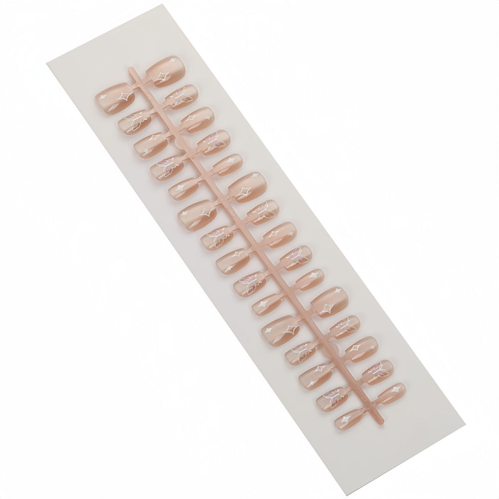Kunstnägel mit floralem und glitzerndem Design Karnz
