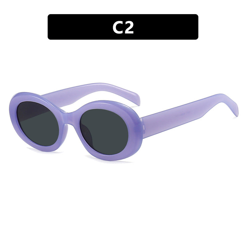 Damen modische Sonnenbrille im originellen Ovaldesign mit transparentem Rahmen und UV-Schutz Karnz