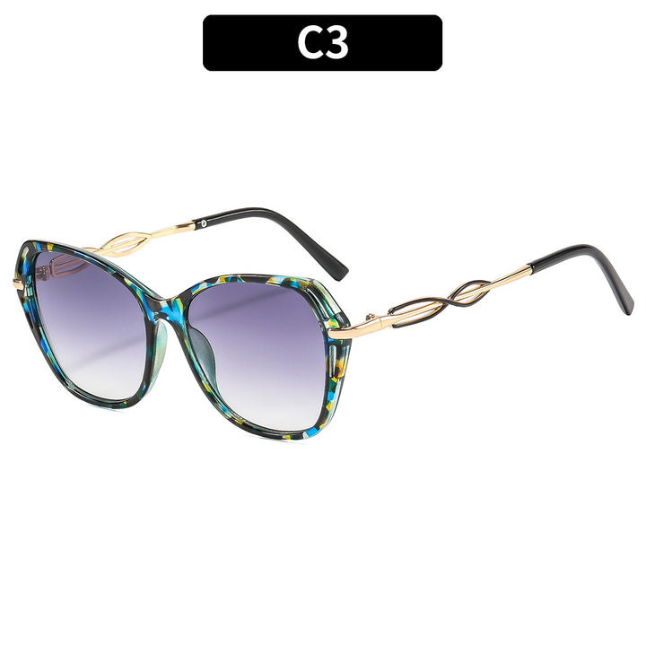 Stylische Cat-Eye-Sonnenbrillen mit eleganten goldenen Akzenten