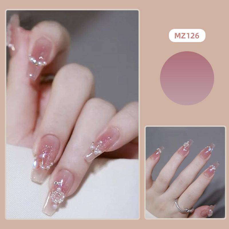 Kunstvolle Nagelverlängerungen mit Blumendesign Karnz