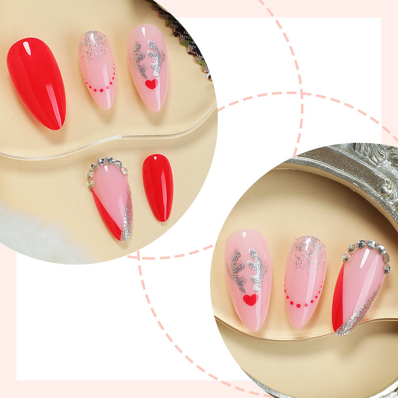 Künstlerisches Press-On Nagelset mit Herz- und Glitzerelementen Karnz