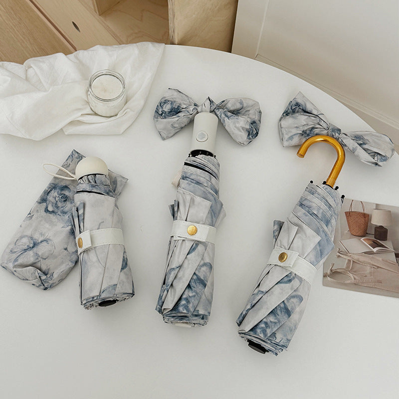 Damen Faltbarer Regenschirm mit romantischem Blumendesign Karnz