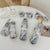 Damen Faltbarer Regenschirm mit romantischem Blumendesign Karnz