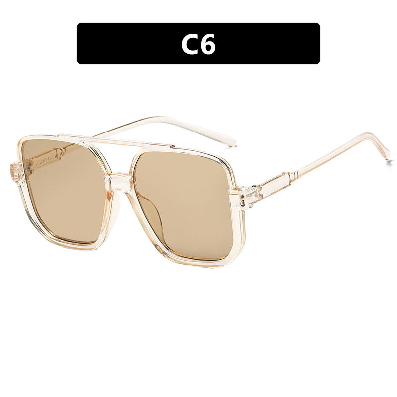 Damen quadratische Sonnenbrille mit transparentem Rahmen und grün getönten Gläsern Karnz