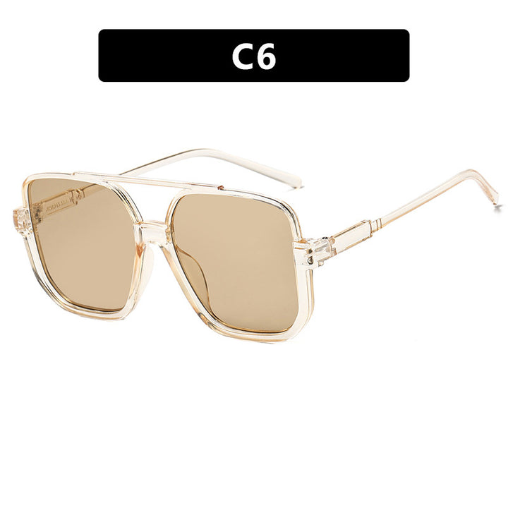 Damen quadratische Sonnenbrille mit transparentem Rahmen und grün getönten Gläsern Karnz