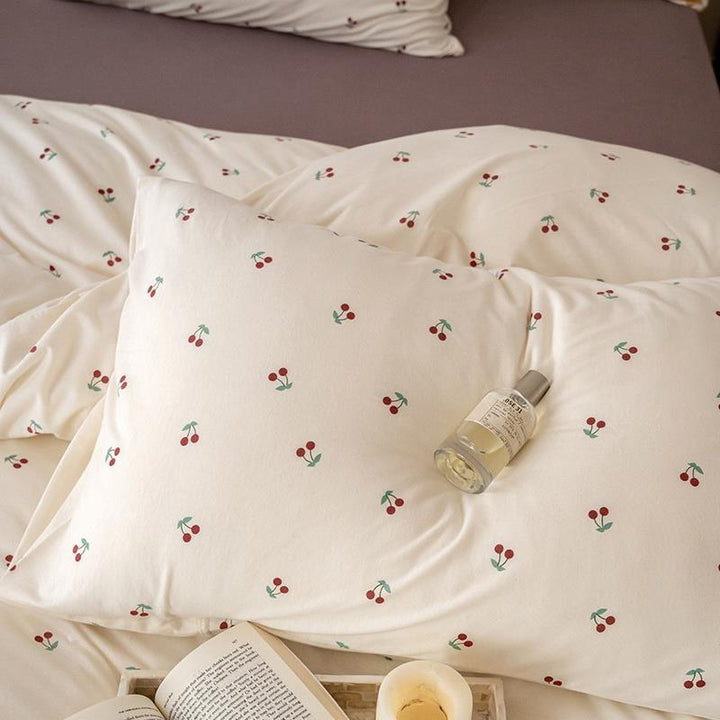 Gestepptes Bettset mit floraler Vintage-Optik und atmungsaktivem Baumwollbezug