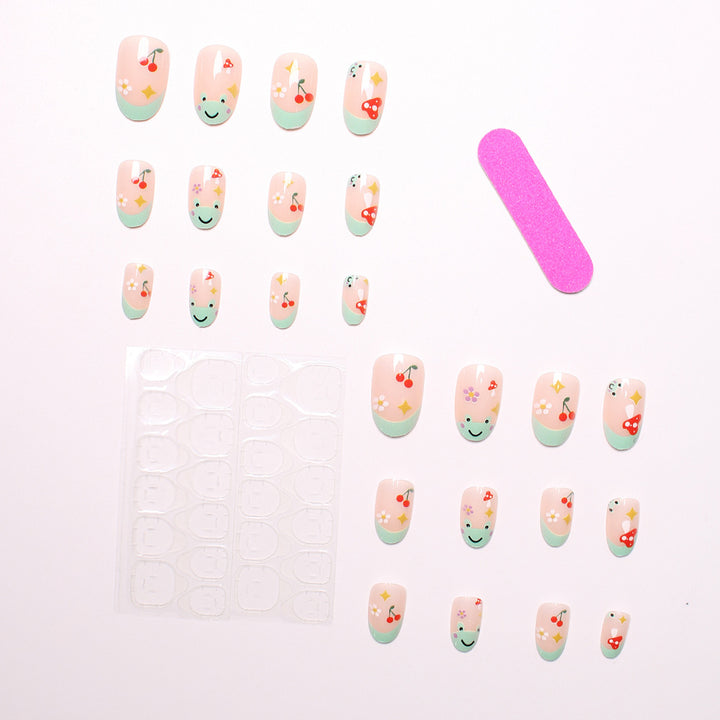 Kunstnagelset mit fröhlichen 3D-Motiven und blühenden Akzenten Karnz