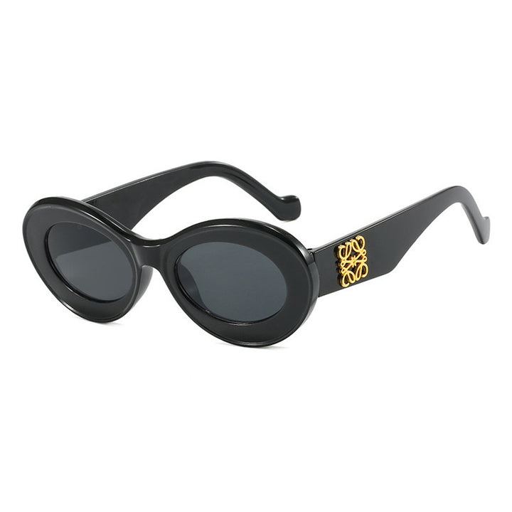 Damen modische Sonnenbrille mit ovalem Rahmen und goldenen Akzenten Karnz