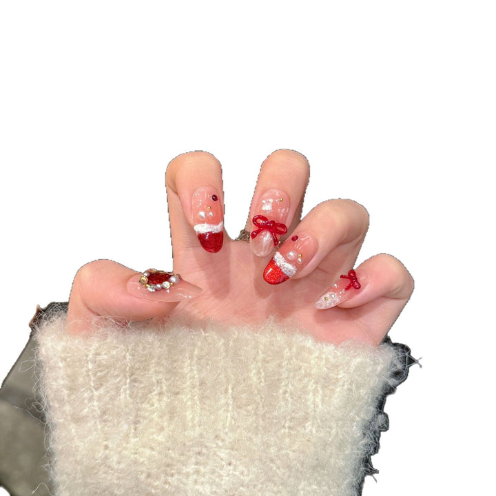 Festliches Press-On Nagelkunstset mit Schleife und Glitzerakzenten