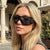 Damen Sportliche Sonnenbrille mit modernem Design Karnz