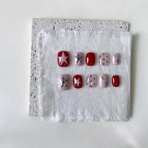 Künstlerisches Press-On Nagelkunst-Set mit Stern- und Punktdesigns