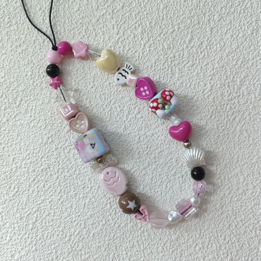 Farbenfroher Charm Perlen Brillenband Karnz