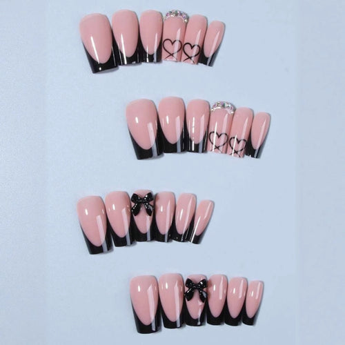 Kunstnagelset mit elegantem Herz- und Schleifenmotiv Karnz