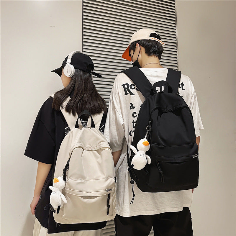 Vielseitiger lässiger Rucksack mit Plüsch Charm Karnz