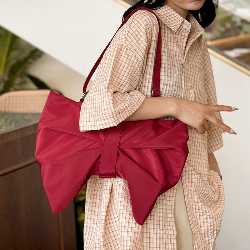 Elegante Schleifen-Handtasche