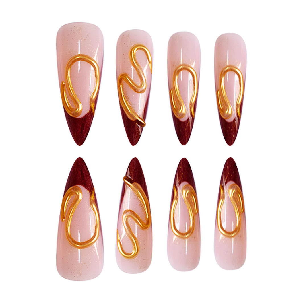 Künstlerisches Stiletto Press-On Nageldesign Karnz