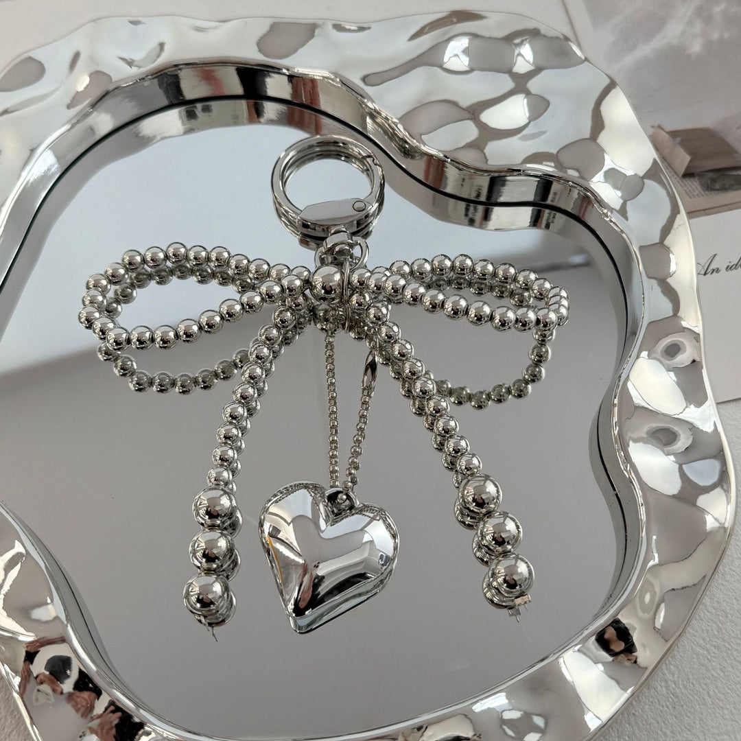 Eleganter Perlencharms-Schlüsselanhänger Karnz