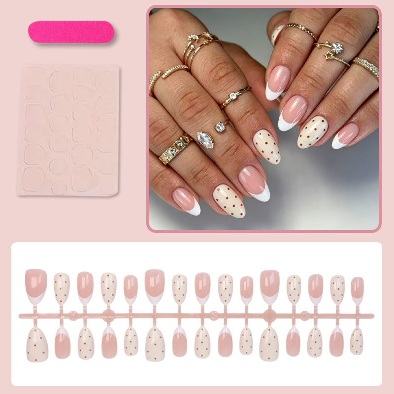 Künstliche Fingernägel mit eleganten Punkten und glamourösen Akzenten Karnz