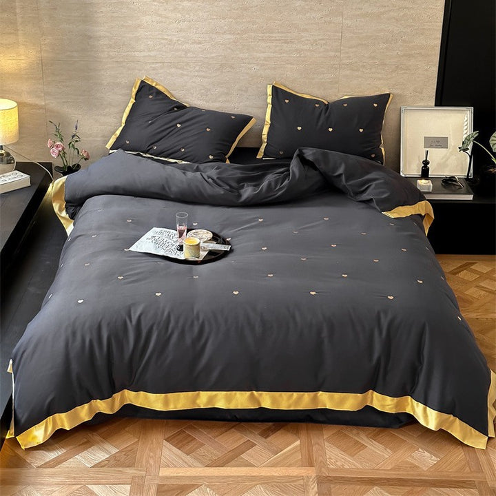Bettwäsche-Set aus Baumwollsatin mit Mini-Herz-Stickerei und Kontrastpaspel Karnz